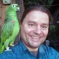 Daniel with Don Jorge's friendly parrot in Pauna 
