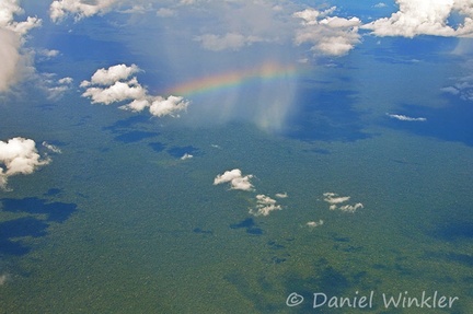 Rainshower w rainbow over Amazon