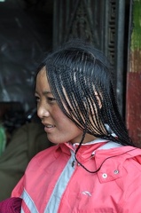 Nomad woman with typical 108 hair braids. 