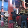 The local community helps erecting the statue of Buddha Shakyamuni.