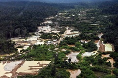 Gold mine in Suriname. Lot's of destroyed land is visible from the plane.