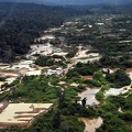 Gold mine in Suriname. Lot's of destroyed land is visible from the plane.