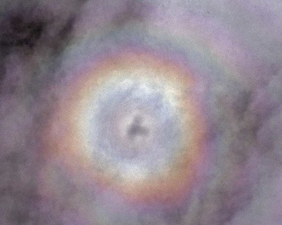 Rainbow sphere seen from the small "Airvan" plane. This optic manifestation is known in Tibet as a "thigle", the closest look alike nature offers for the human aura