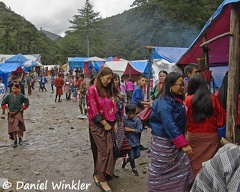 People at the tent stores at the Muhsroom festival in Genekha